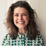 pexels photo 774909 774909 Portrait of a joyful brunette woman with a vibrant smile indoors, capturing happiness and positivity.